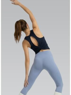 Back view of custom yoga tank showing open back design and fitted silhouette, 4-way stretch fabric