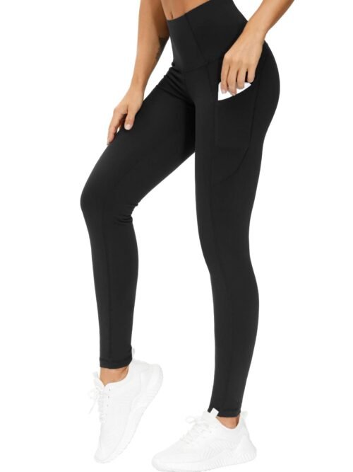 Women's black thick high waist yoga pants with pockets worn by model, tummy control 4-way stretch leggings for yoga running and gym