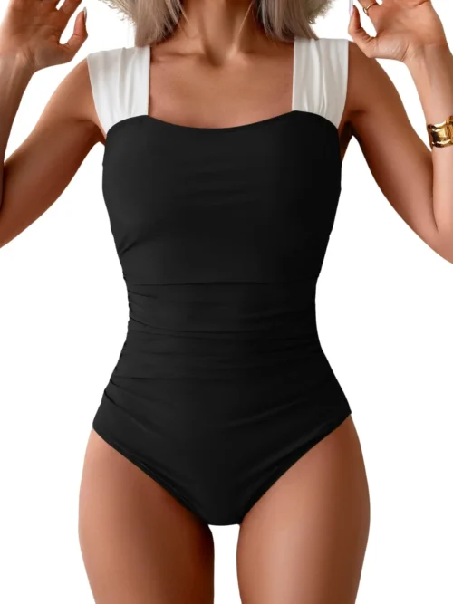Vintage square neck swimsuit in classic black with white contrast shoulder straps, tie-back closure, retro-inspired design