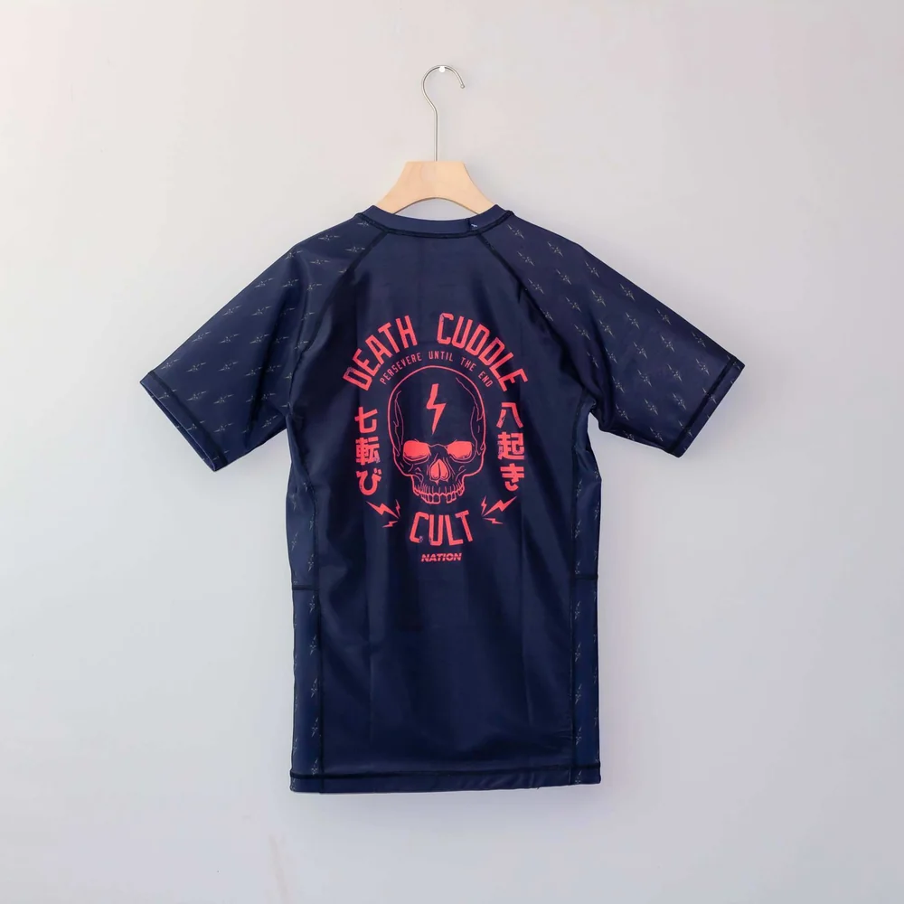 custom rash guard manufacturer UPF 50+ flatlock seams compression combat surf wear