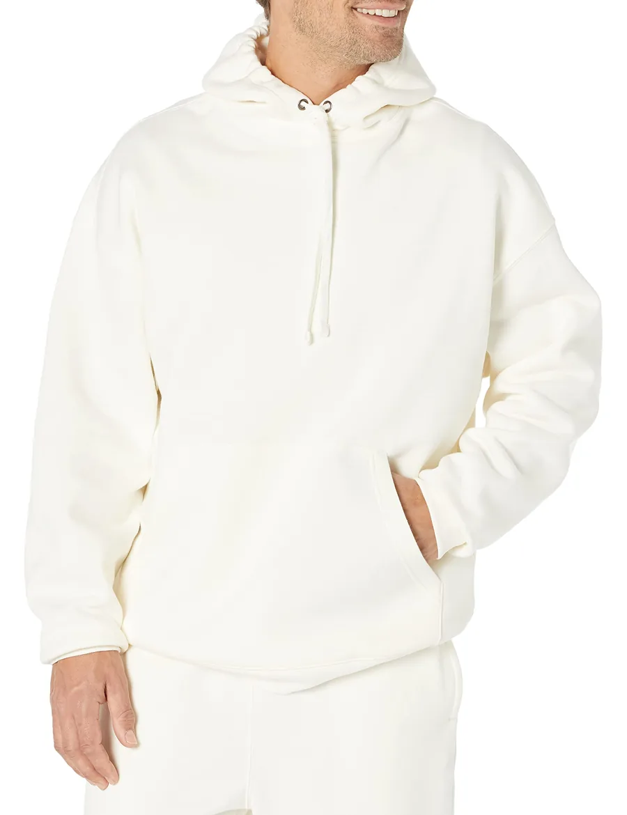 Heavy 550 GSM 2x2 spandex-reinforced ribbing cuffs and bartacked kangaroo pocket detail